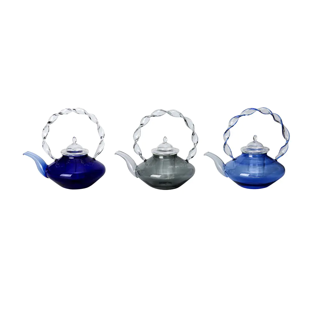 Tetera de vidrio de borosilicato coloreado con mango de vidrio retorcido