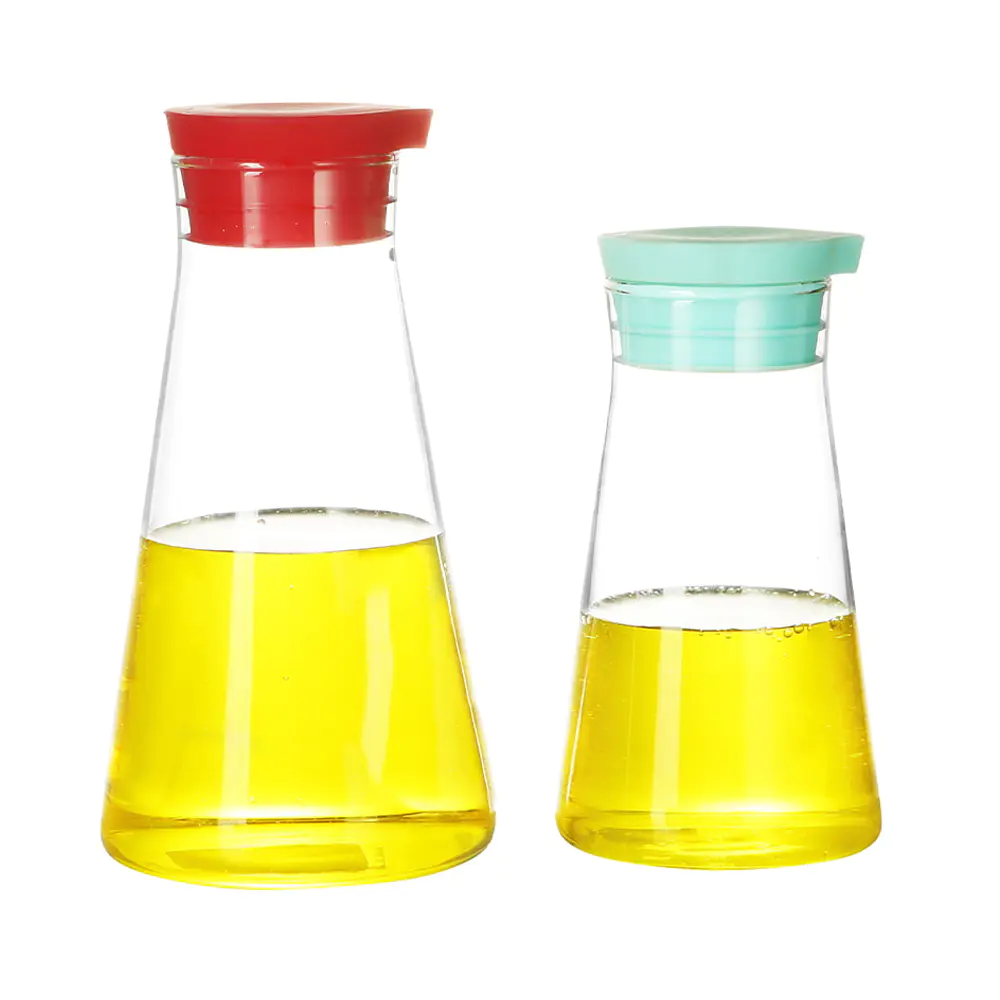 Botella de condimento de vidrio de borosilicato transparente con tapa roscada